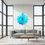 Thumbnail: Blue abstract wall clock in modern living room with large windows.