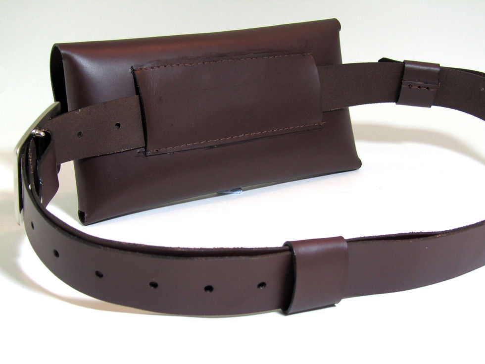 Thumbnail: Leather belt bag with origami construction and metal studs