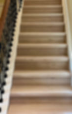 Modern oak staircase flooring installation in Palm City Florida home