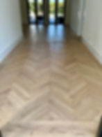 Chevron hardwood flooring installation in Jupiter Florida luxury residence