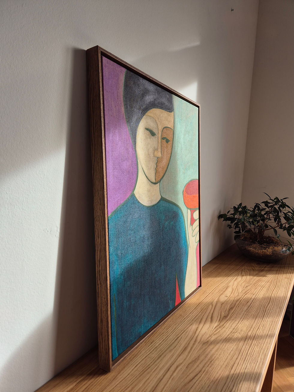 Thumbnail: Semi-abstract figure with divided face holding a red cup, teal top, lavender and mint background, acrylic on canvas
