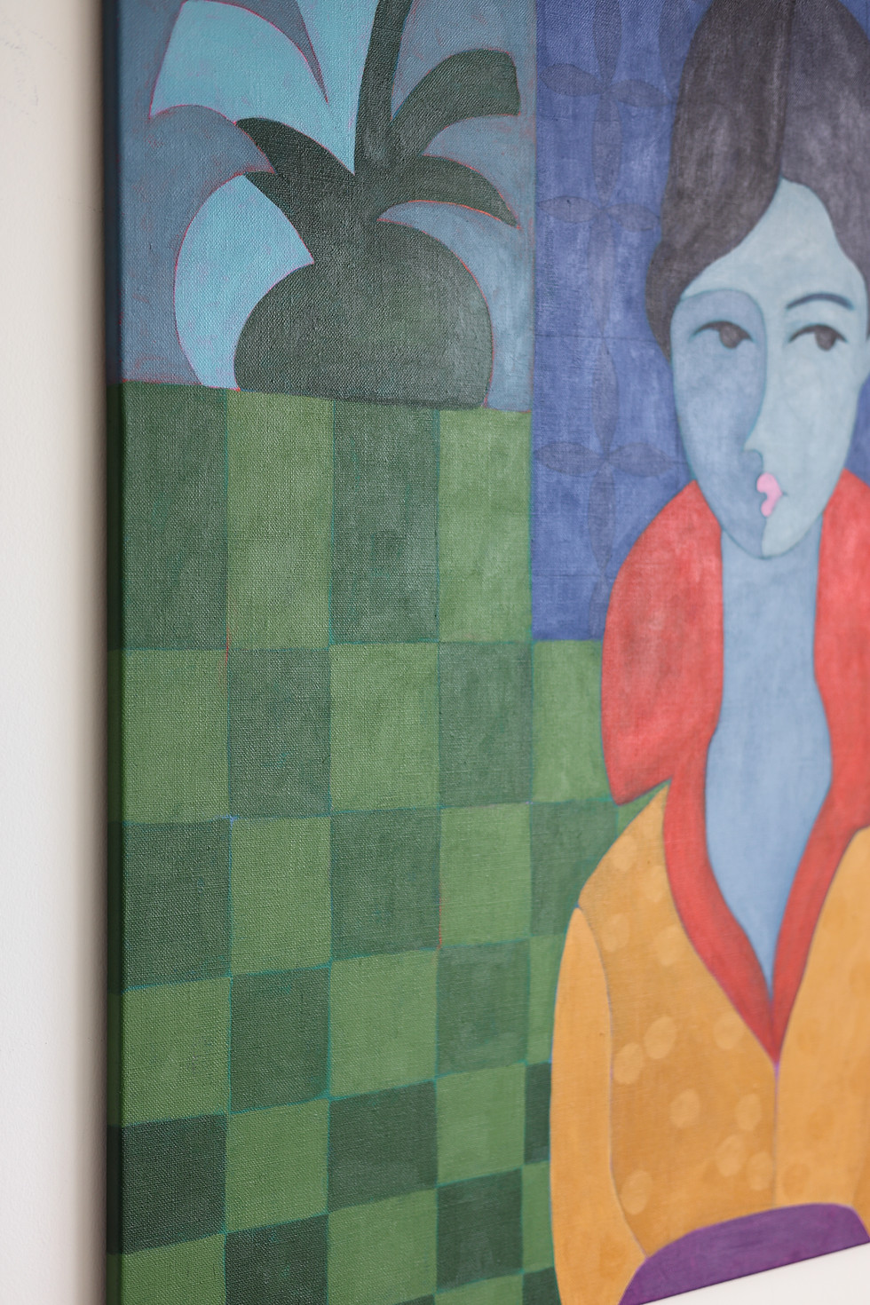 Blue-toned figure, red collar, yellow top, green checkerboard floor, patterned blue wall, acrylic on canvas