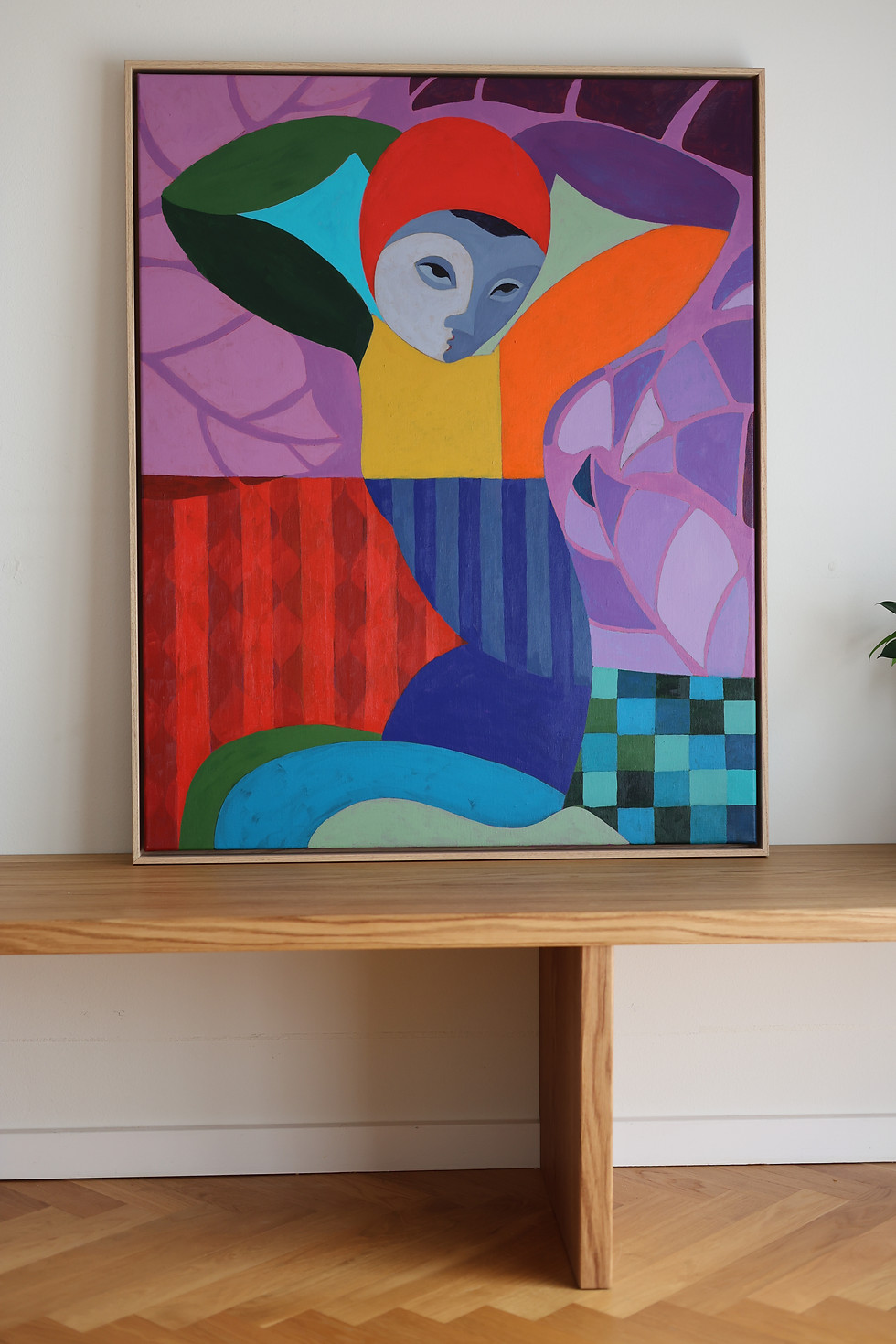Thumbnail: Figure with red cap, arms raised, bold geometric blocks, botanical background, purple green teal, acrylic on canvas