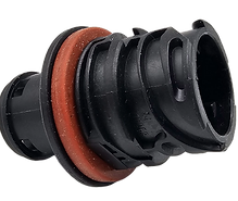 Black plastic automotive bulb holder with rubber gasket