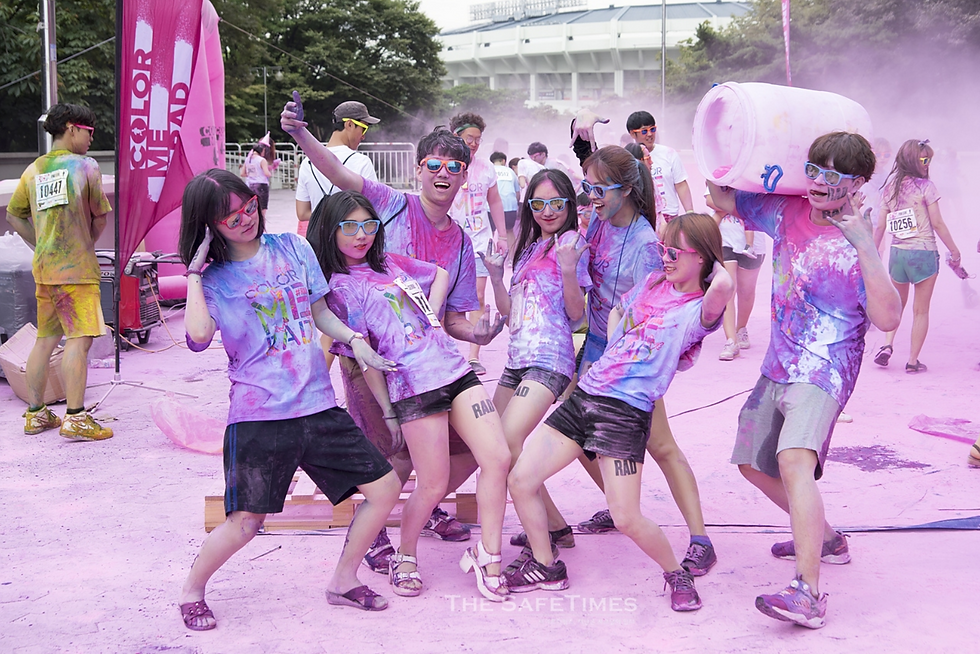 High schoolers in Seoul covered in color at the Color Me Rad festival, July 2017. Credit: The Safe Times.
