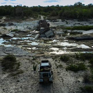 Road to Zinave National Park, thankfully we could drive through the river with out car