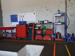 A rack of supplied automotive tools and equipment