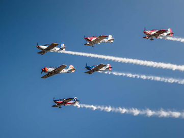 Flyover by the Bandit Flight Team to highlight patriotic pre-race ceremonies at July 1 event