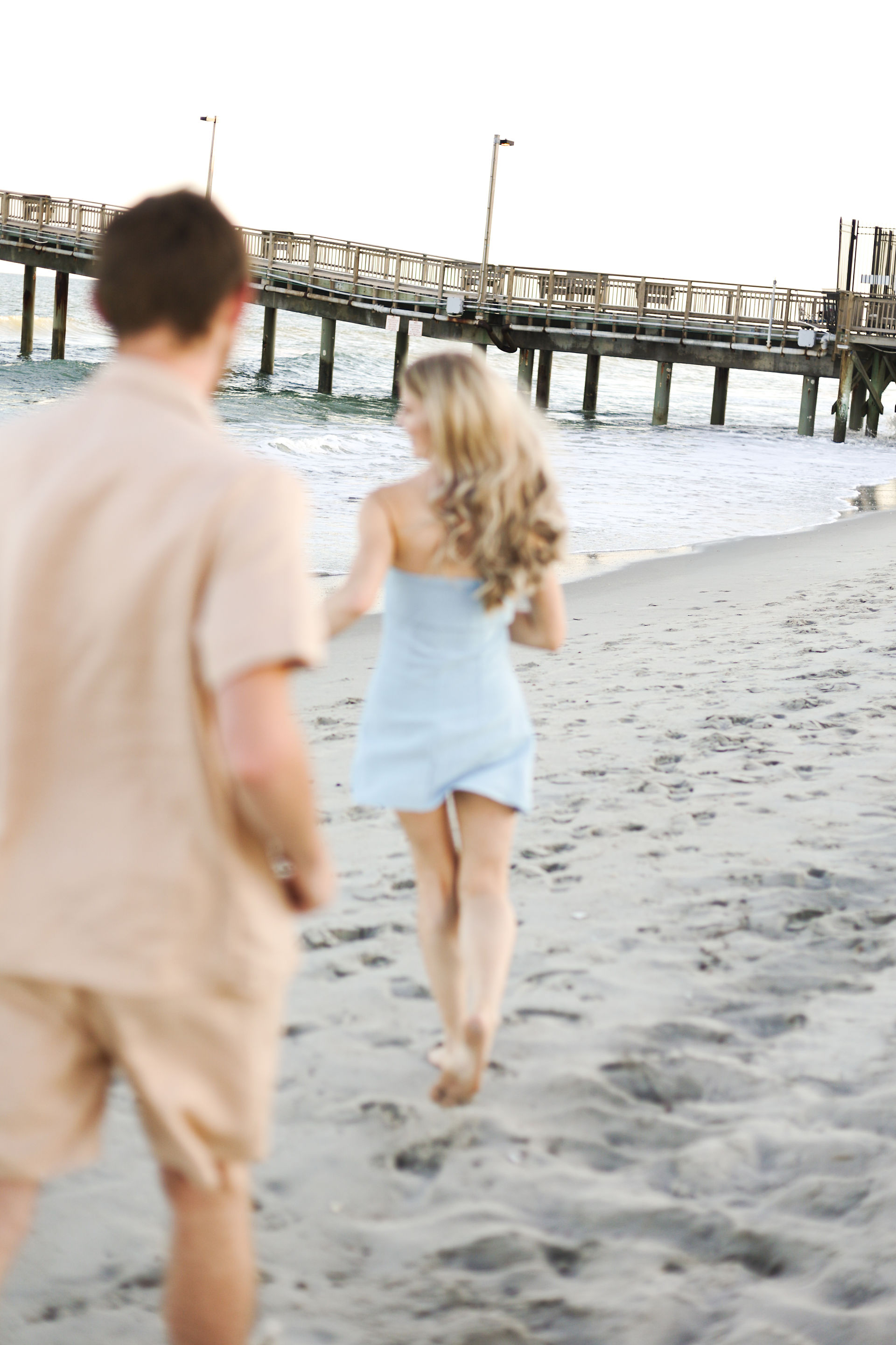 Cute couples photosession with LUVJOY Studios on the beach