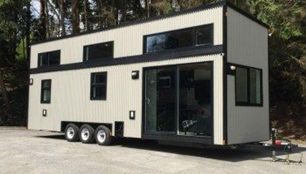colorful+trailer+house+Tiny+House_Veldkamp+container+dining+gazebo+Strapped+dehatinyhouse-