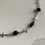Thumbnail: Crosses and Black Beads Necklace