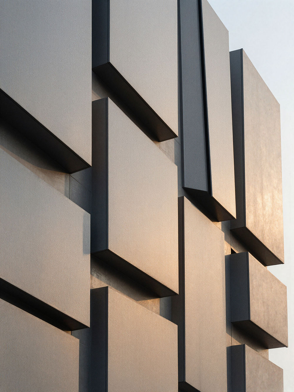 Architectural facade, protruding rectangular panels