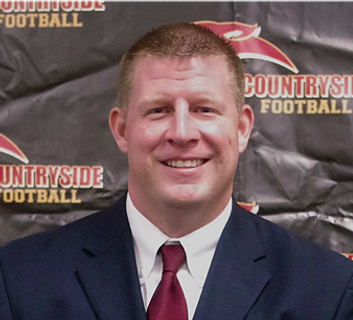 Coach Eric Schmitz_edited.png