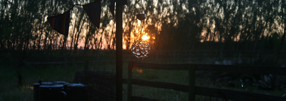 A sunset view from the porch of a summer house in the Fens
