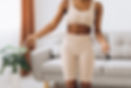 young-black-woman-measures-her-waist-living-room-background-concept-diet-weight-loss.jpg