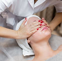 young-beautiful-girl-lies-beautician-s-table-receives-procedures-light-facial-massage-usin