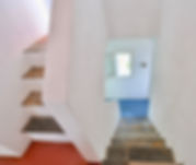 Steps up and down from the kitchen.