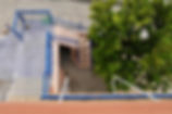Steps down from balcony