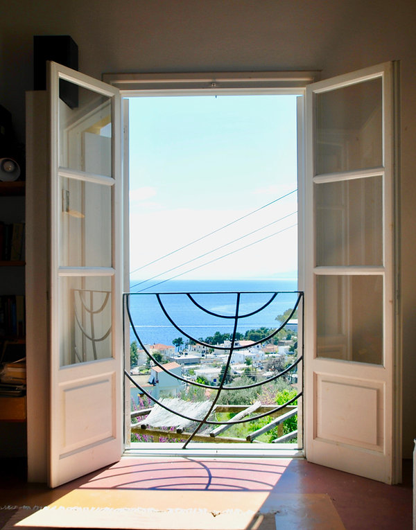 Juliet balcony looking out to the Aegean Sea.