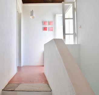 Top floor landing opening out to large balcony.