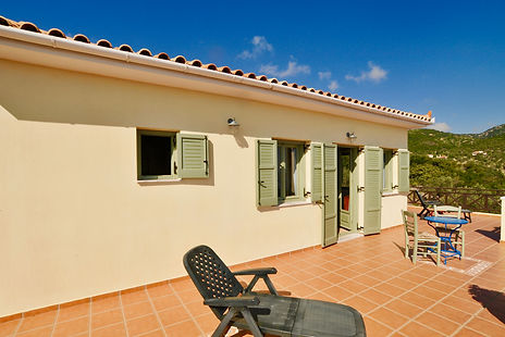 french Windows and balcony of an Alonissos villa.