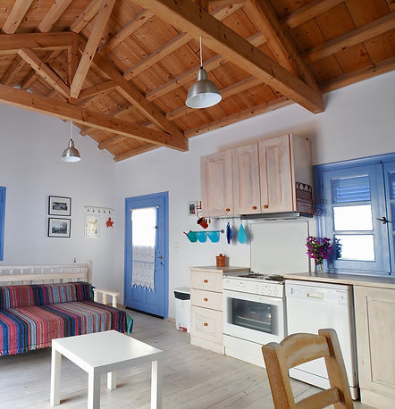 Open plan, beach hut style interior of a