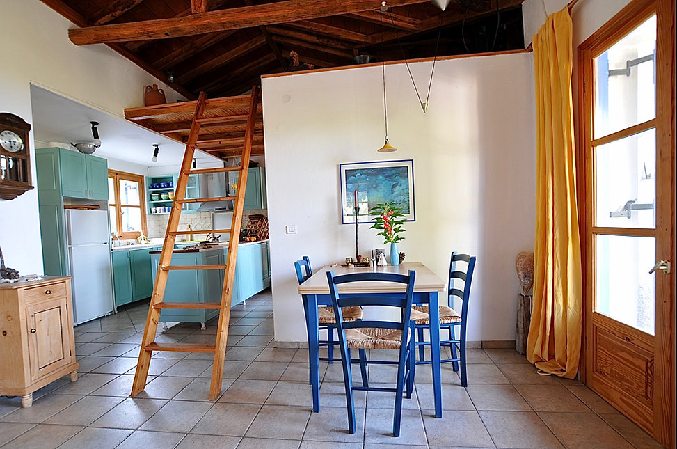 Dining table and three blue chairs