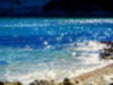Sparkling sea water of the blue Aegean sea.