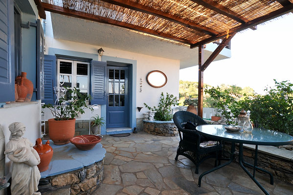 Greek shaded courtyard with door to house
