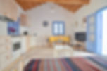 Interior of pen plan modern holiday home in beach hut style