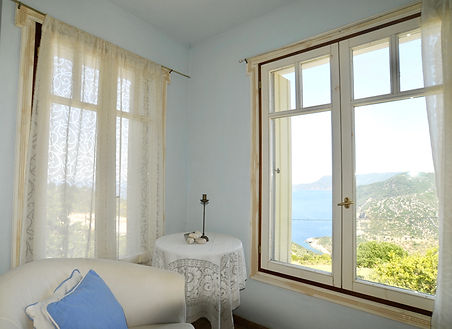 Corner of Bedroom with View out of windo