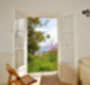 French windows from 2nd bedroom, looking out to the garden.