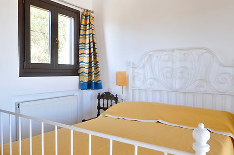 Bed with window to side