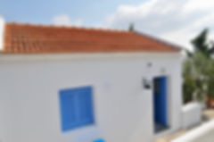 Entrance to blue and white Greek house.