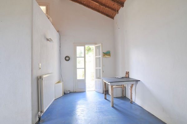French windows opening out to small private balcony.