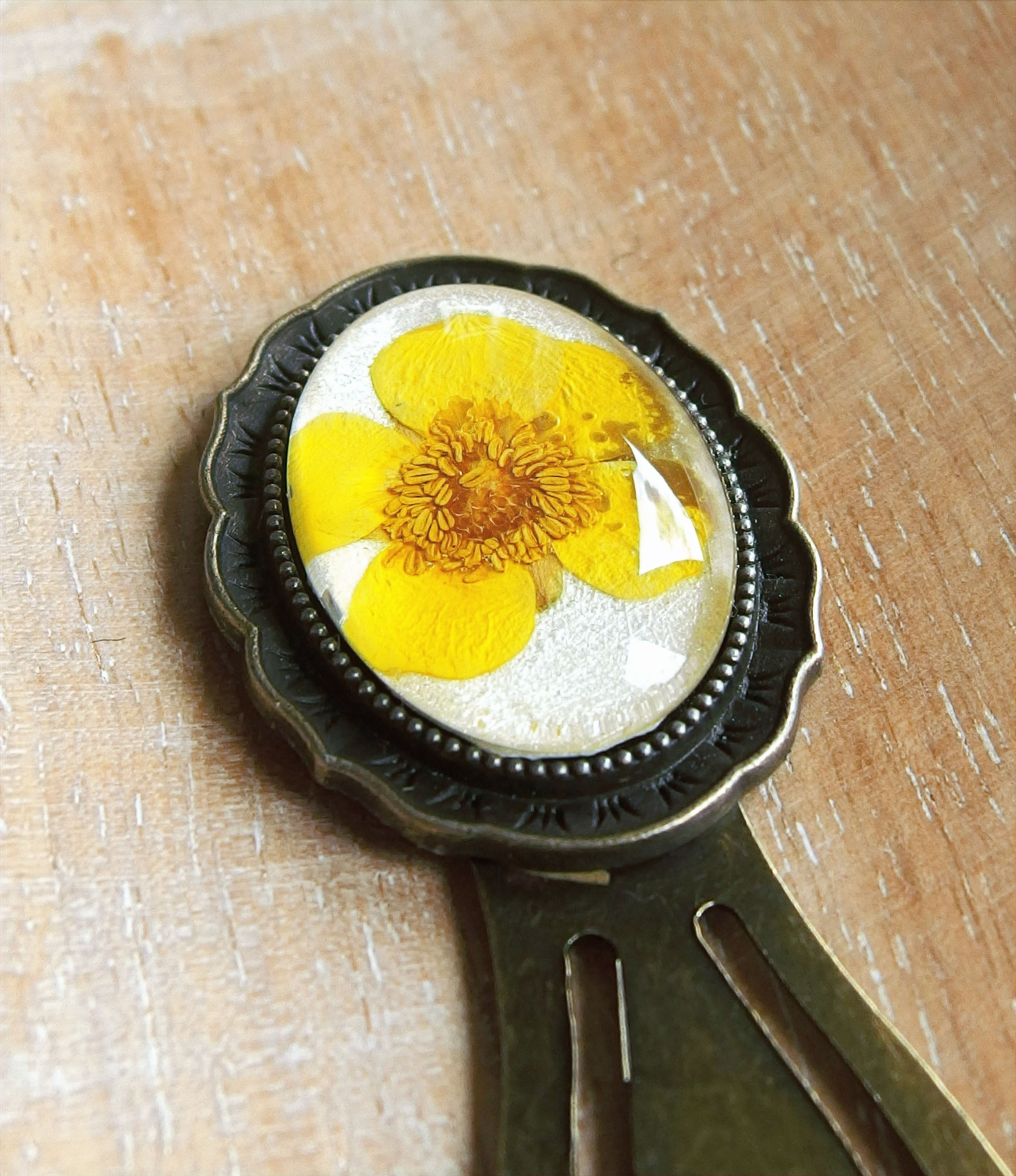 Lesezeichen Oval 25x18mm Hahnenfuss