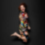 How to Fascinate's CEO Sally Hogshead posing for a branded content photoshoot.