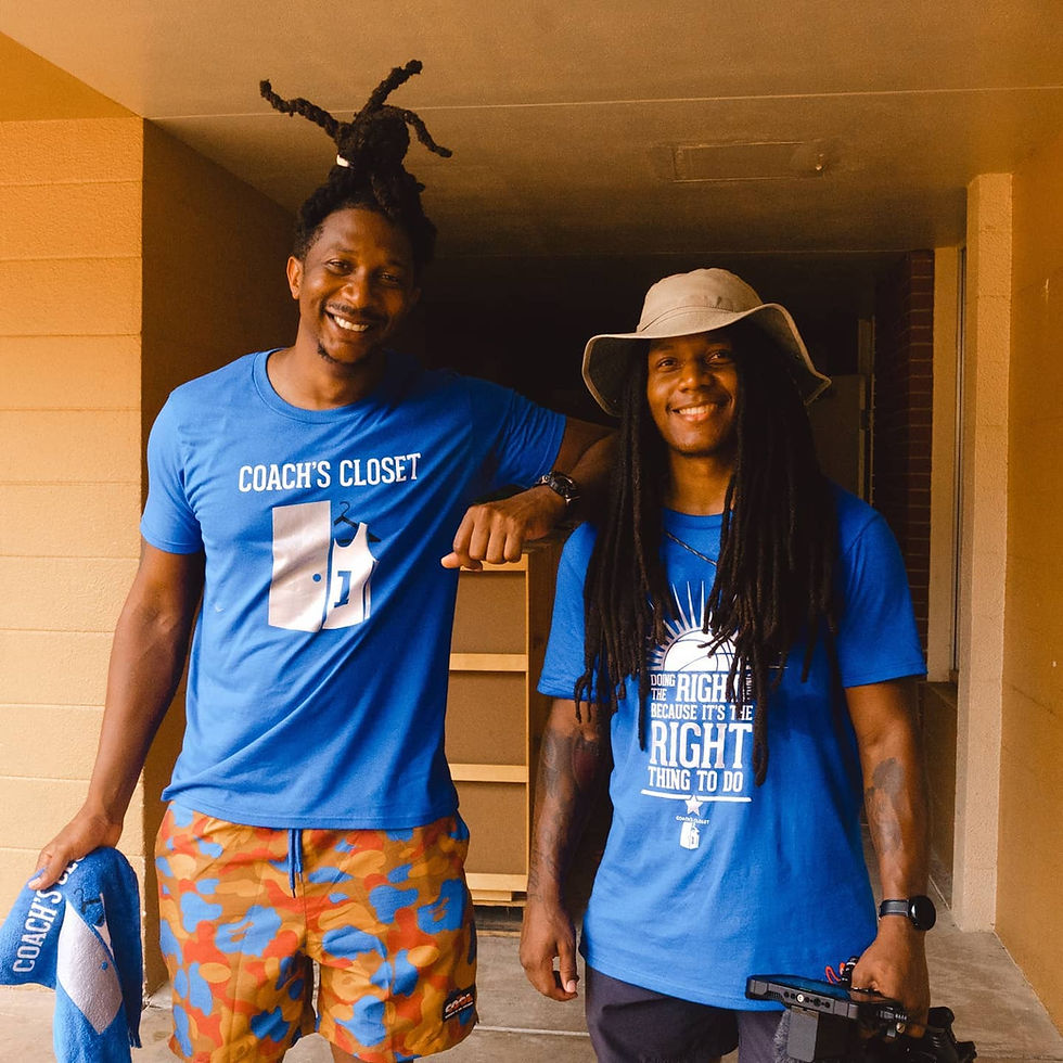 Vernon Chipman Jr and De'Quan Crenshaw (Cuzzo Dae Dae) posing for a video and photo marketing campaign on behalf of Coach's Closet's Christmas in July event in Orlando, Fl captured by That Brand Guy.