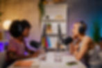 two-podcasters-are-sitting-in-a-home-recording-stu-2023-11-27-05-22-48-utc.jpg