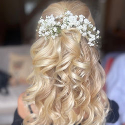 Flowergirl half up hairstyle