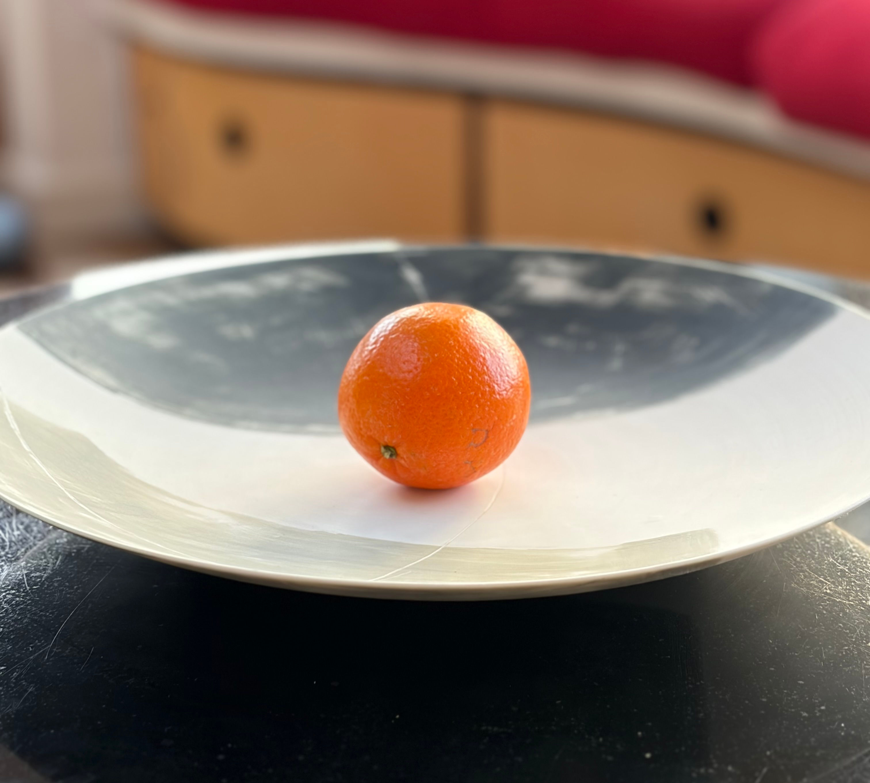 Wide, shallow bowl. Abstract greys