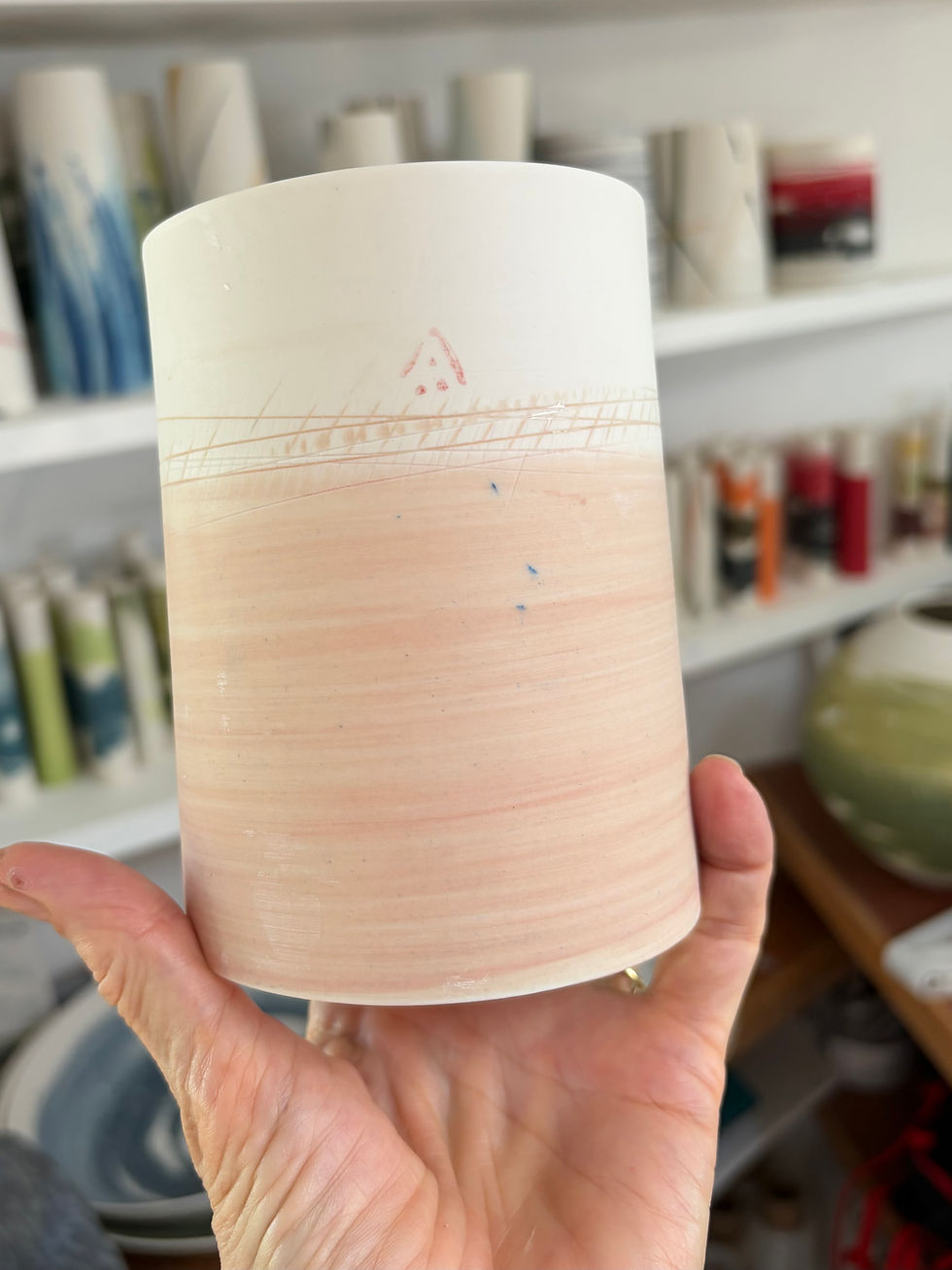 Thumbnail: Pale peach/pink cylinder.