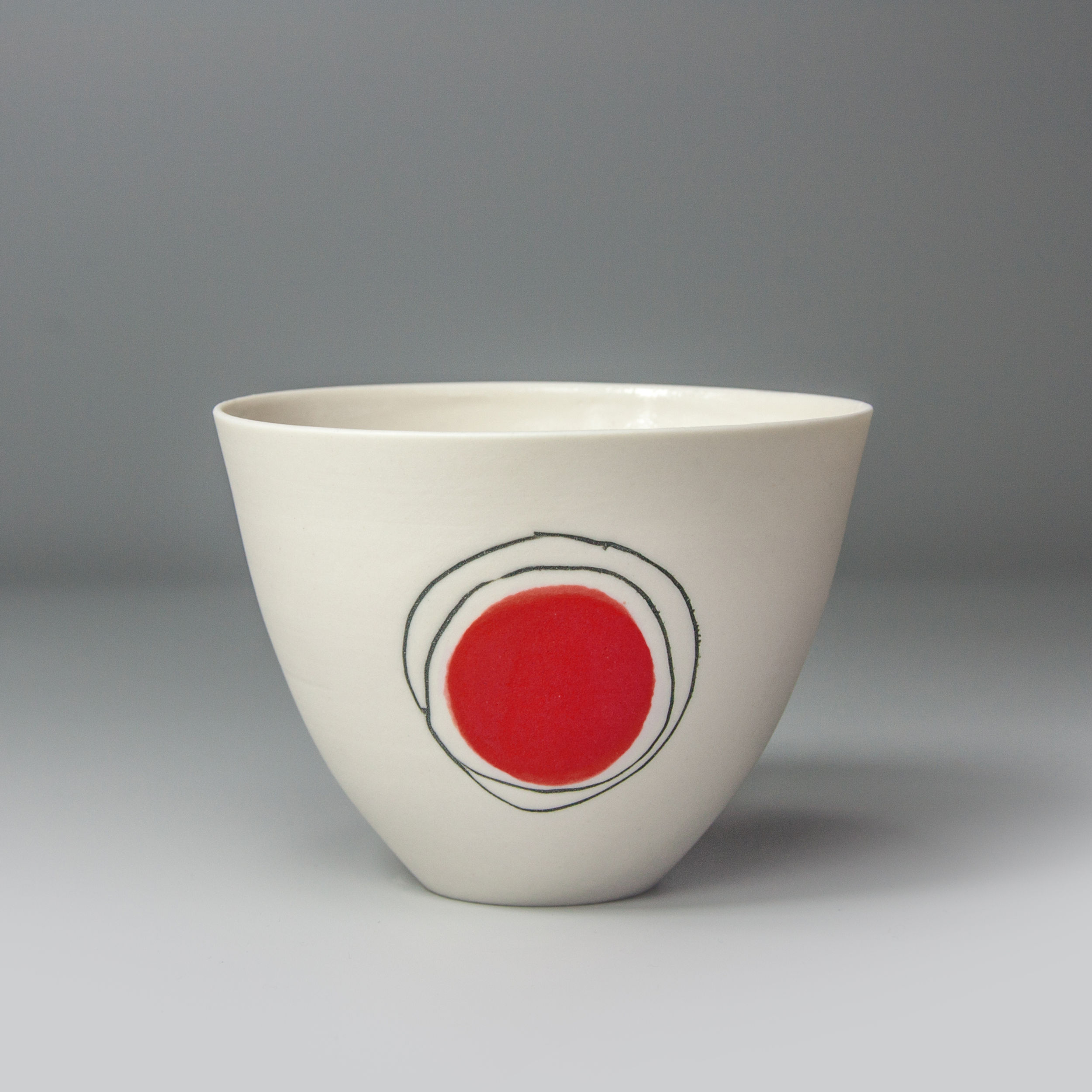 Small cup/bowl. Red dot