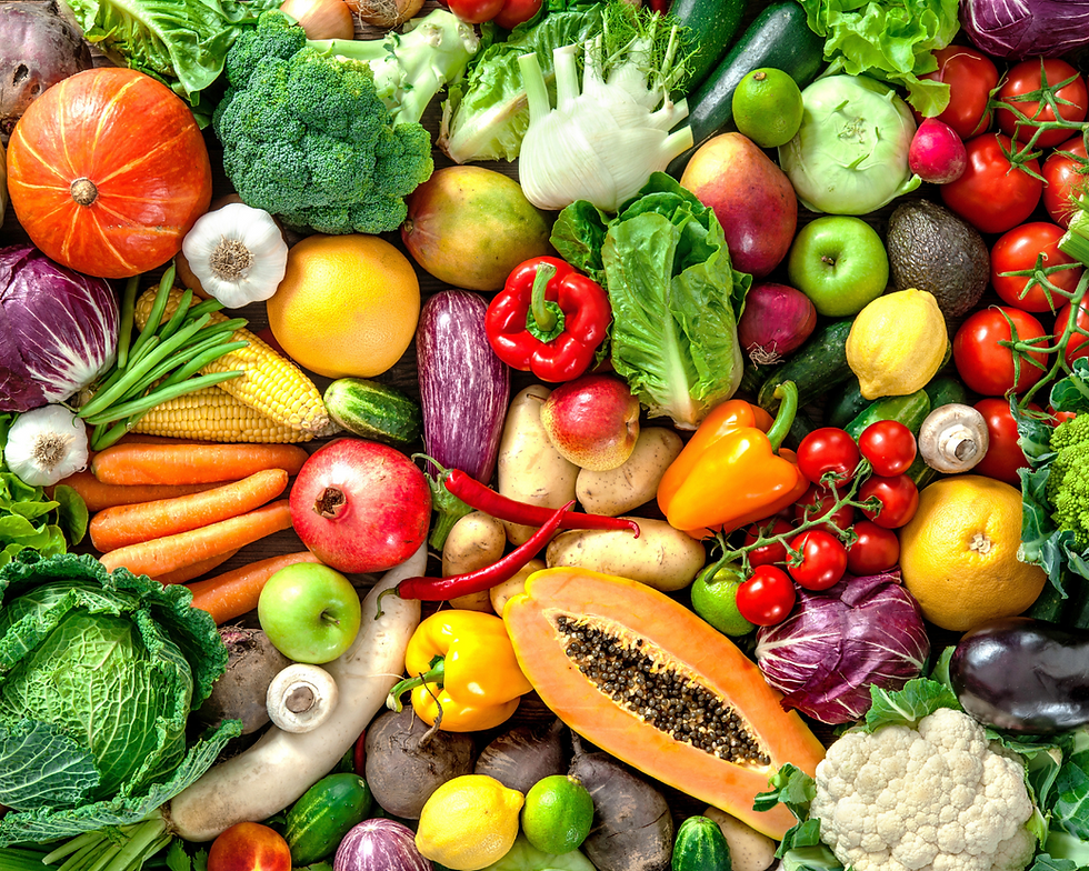 Table with raw fruits and vegetables
