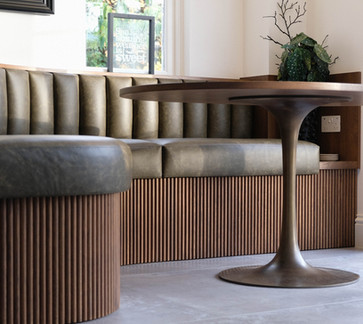 Mid-stain - Reeded oak - Liquid metal brass tulip base - Sunburst oak veneer - Recycled leather upholstery