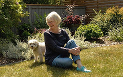 Alice Major and her dog Moose in their garden. Credit Shawna Lamay.