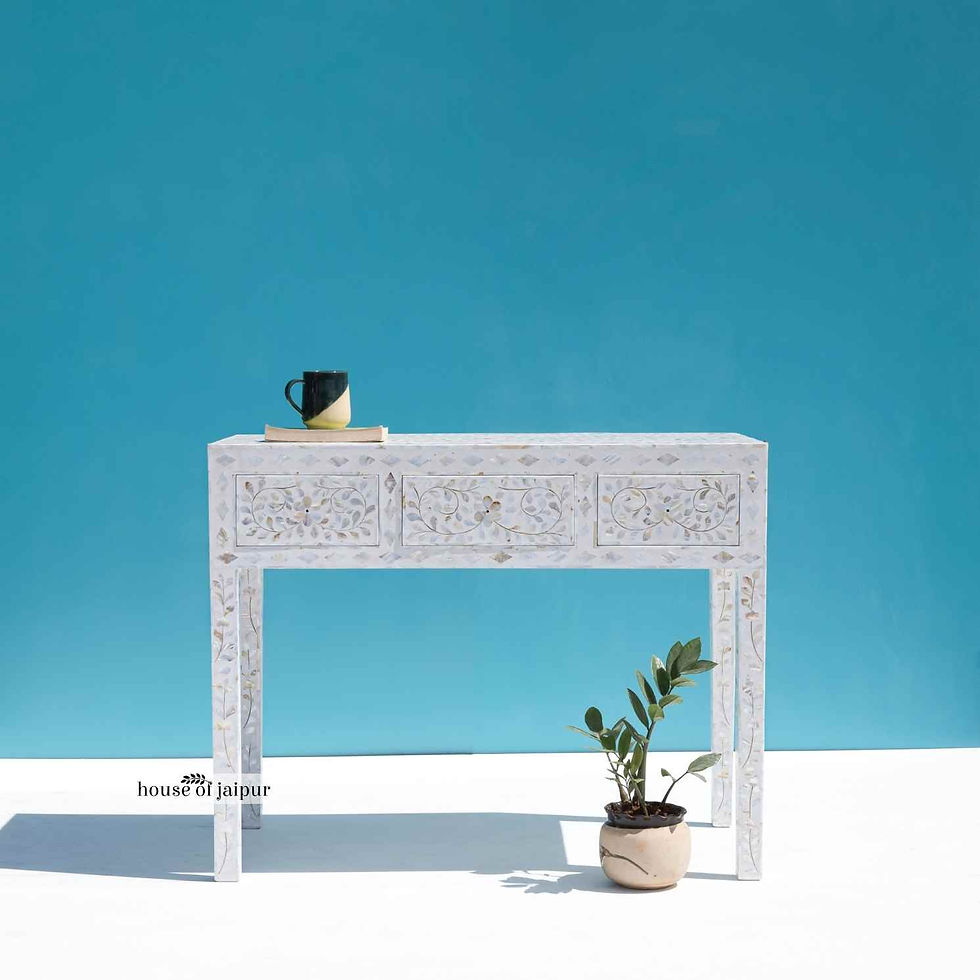White mother of pearl inlay console table with floral vine pattern and three drawers, handcrafted by House of Jaipur.
