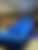 Large blue inflatable slide indoors