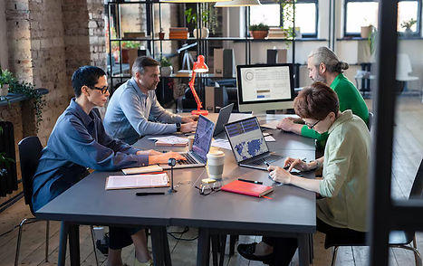group-business-people-sitting-table-working.jpg
