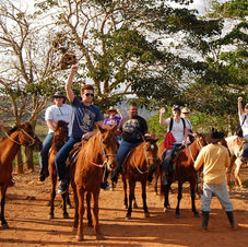 Stacie Freeman leads a group of Bethel University students on a horseback ride through the Valley of Silence in Cuba - March, 2016.